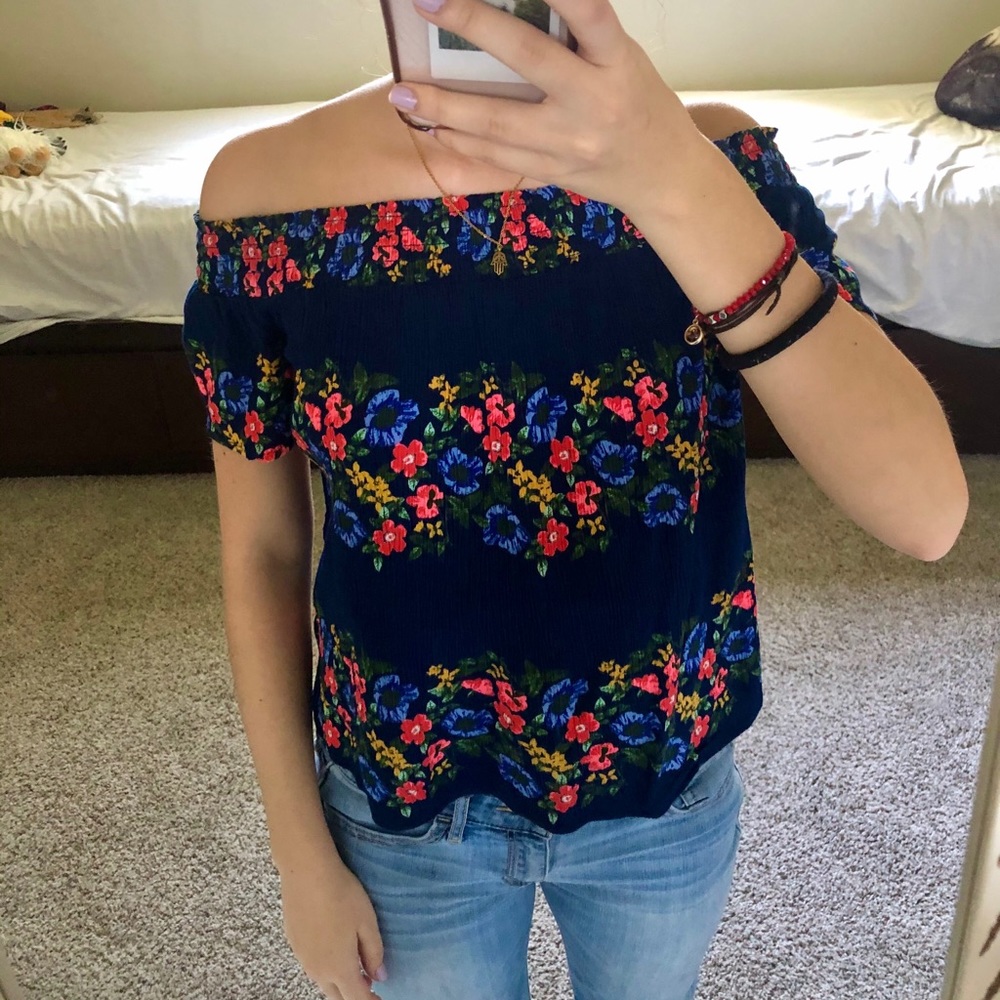 Off the shoulder blue shirt with flower pattern
